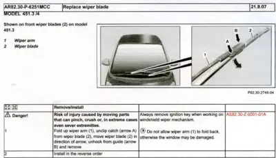 Wiper blade replacement diagram showing front view of car windshield and close-up of blade attachment points with labeled arrows.