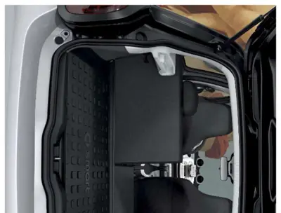 Open car door showing interior floor mat and door panel trim.
