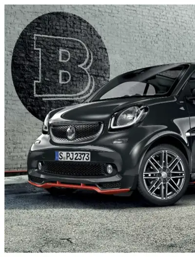 Black Smart ForTwo with red front bumper accent and multi-spoke alloy wheels displayed against brick wall.