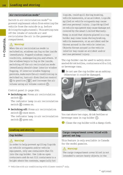 Owner manual page showing HVAC air recirculation controls, cup holder in dashboard, and cargo area safety information.